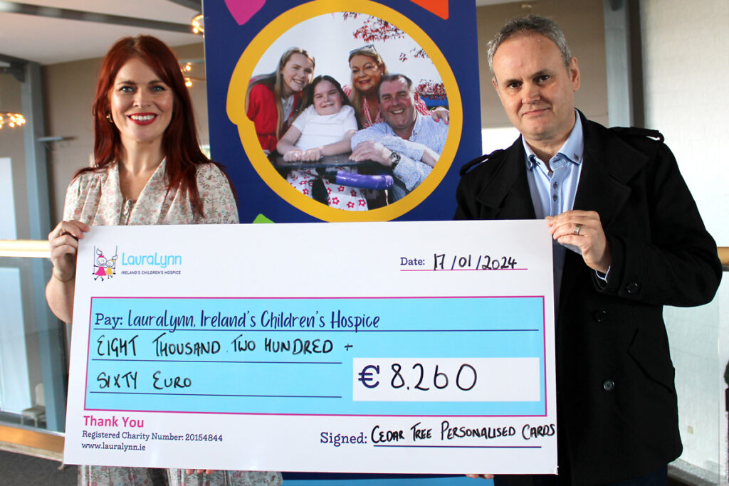 Niamh Doyle from LauraLynn accepting the Cedar Tree Greeting Cards donation
